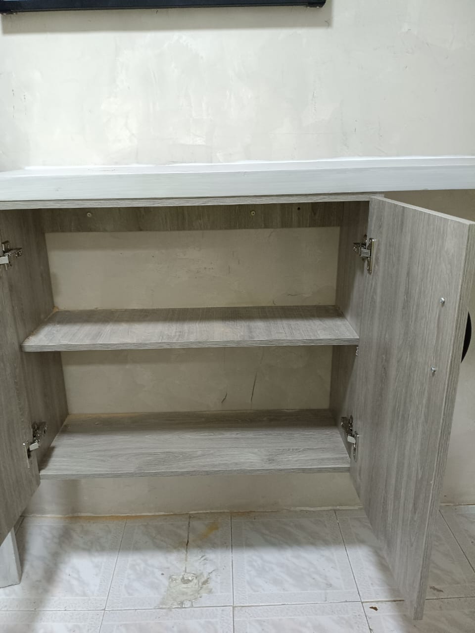 Mueble de baño renovado — detalle